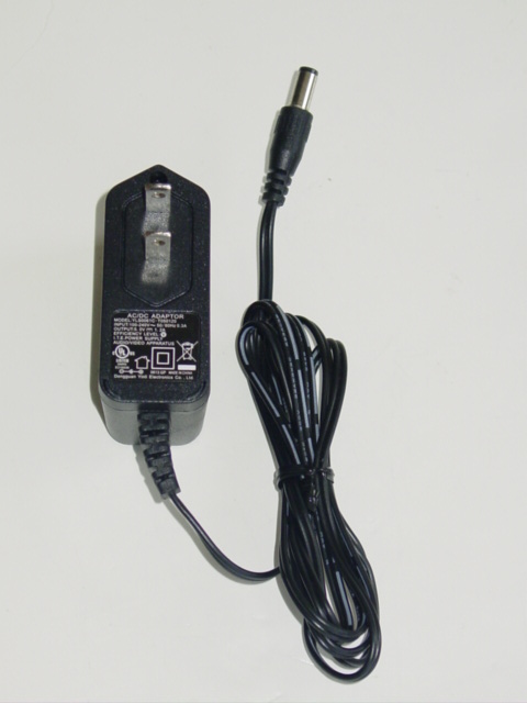 NEW Dogguan Yinli YLS0061C-T050120 AC Adapter 5V 1.2A YLS0061CT050120